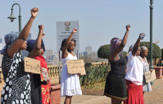 © GovernmentZA / Flickr A group of women re-enact the 1956 women's march to Pretoria protesting against pass laws.